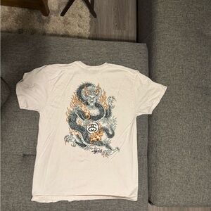 Stussy Cream Tee with Fiery Dragon Design